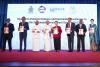 ESCAP executive with VIP guests on stage in the event.