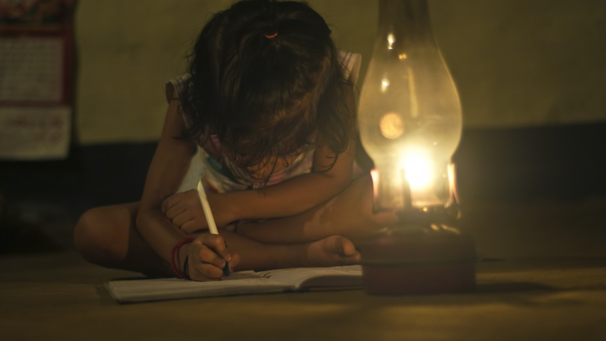        Child doing home-works
      